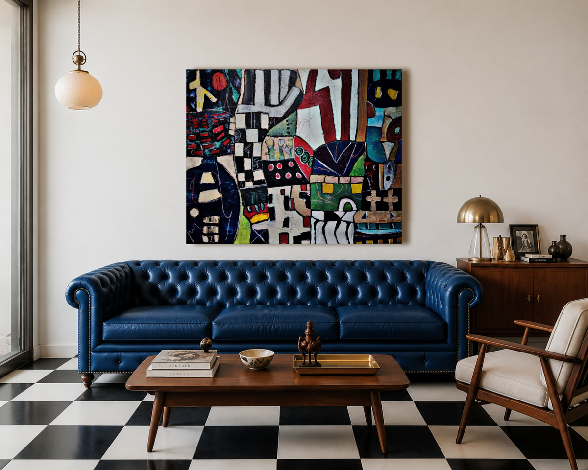 A large, colorful abstract canvas print hangs on a white wall above a blue leather Chesterfield sofa in a modern living room with a black and white checkered floor.